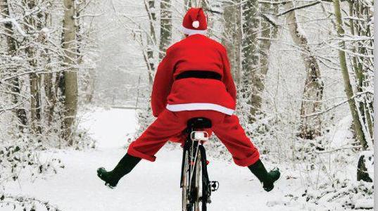 père noël sur un vélo